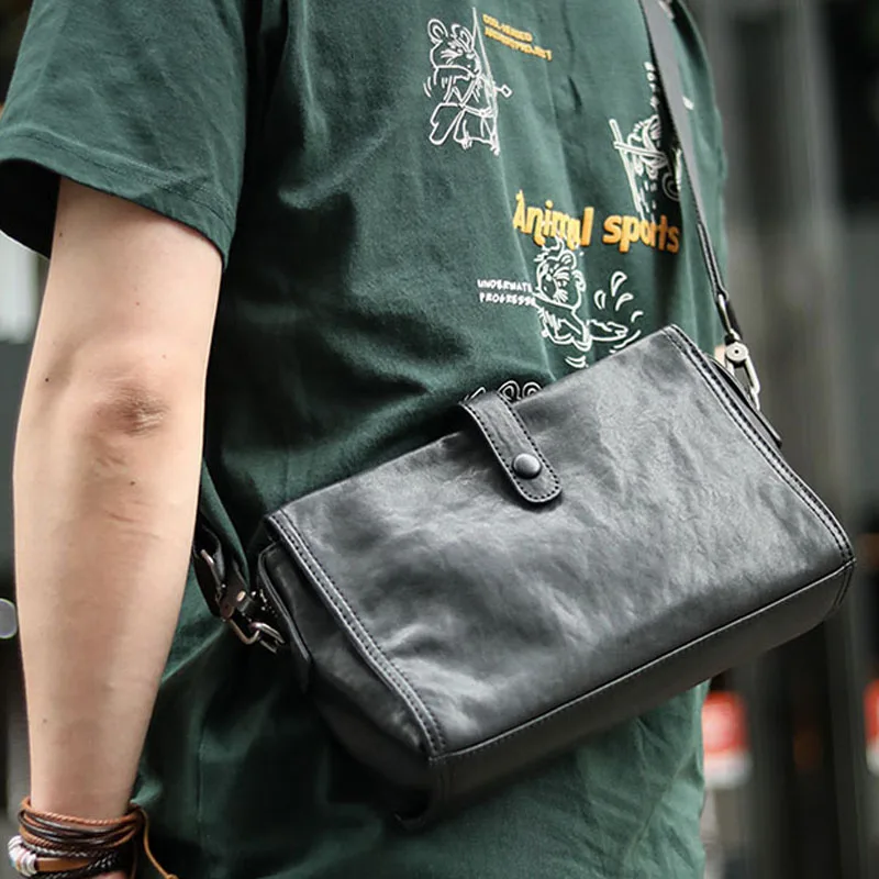 AETOO  Original niche design clutch bag shoulder messenger bag vegetable tanned cowhide envelope bag genuine leather men's small