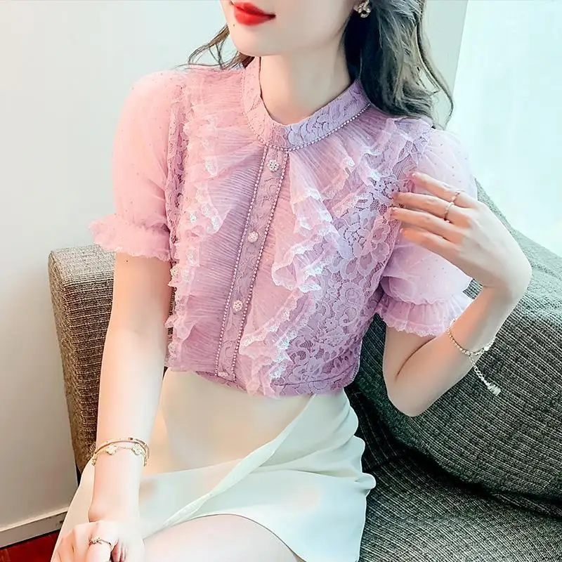 

Blouse 2022 Summer latest women's French court wind lace lace stitching wood ear ear small collar drilling short -sleeved blouse
