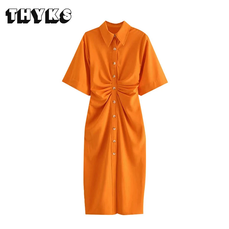 

Женское платье-рубашка средней длины на пуговицах, с коротким рукавом