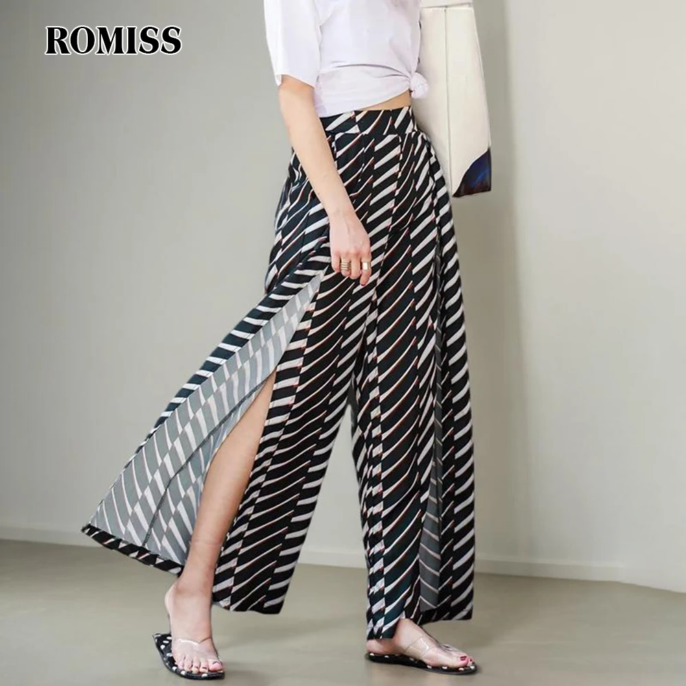 Женские брюки в полоску с высокой талией и карманами