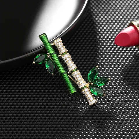 Зеленые броши из металла в форме листьев бамбука