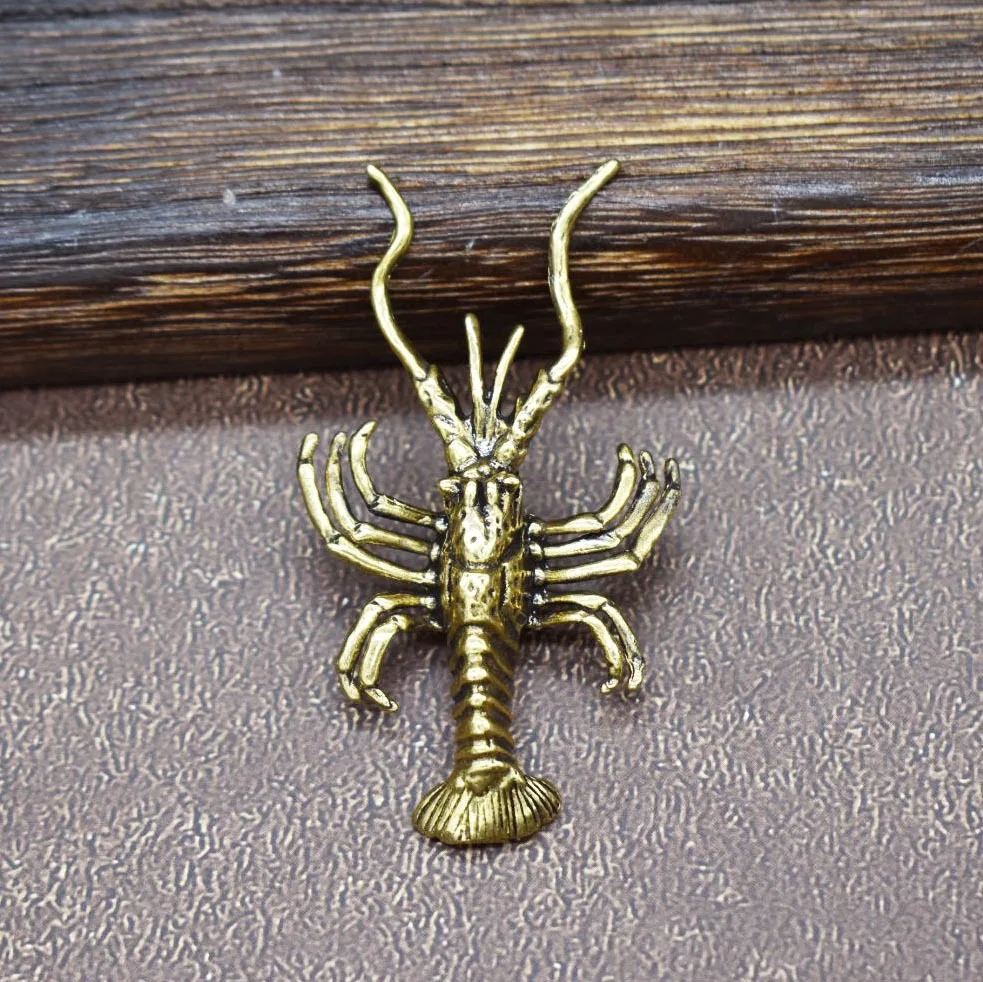 

Миниатюрная медная статуэтка омара