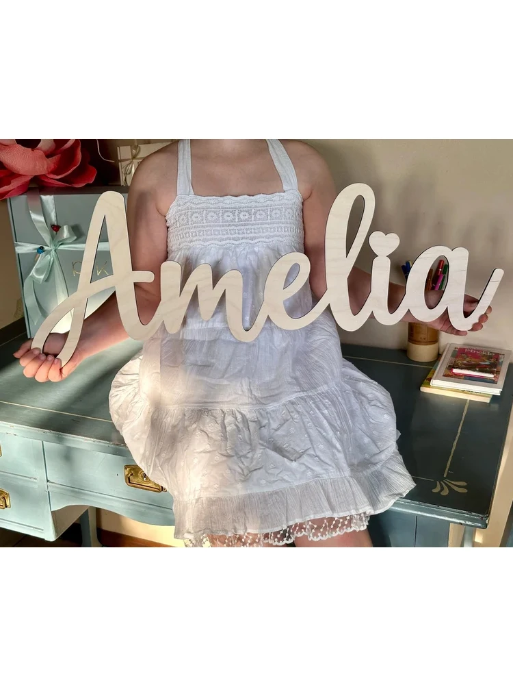 

Деревянная вывеска с именем JingQianLong