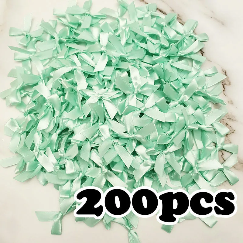 

200 шт. розовых атласных лент-бантиков RIBBON HOUSE