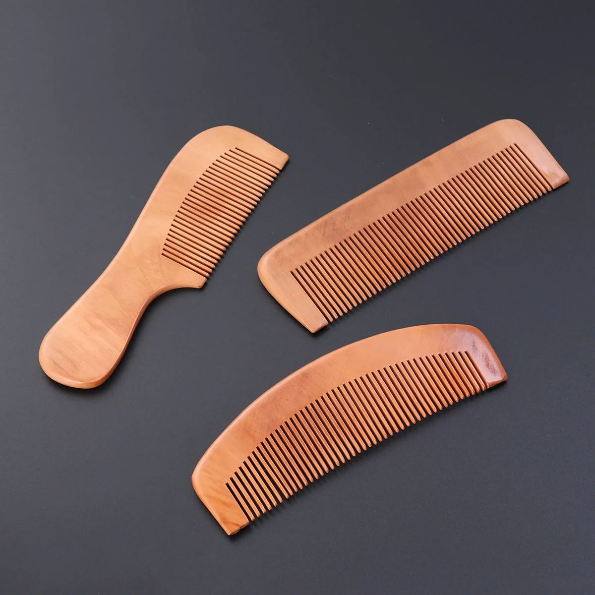 

Combs Shape Square Handle Anti-static Portable Carved Peach Combs 3PCS
