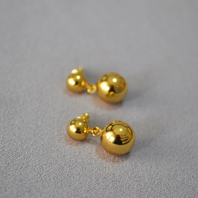 

Cold Wind Brass Hollow Bright Double Ball Simple Temperament Stud Earrings Earrings Women