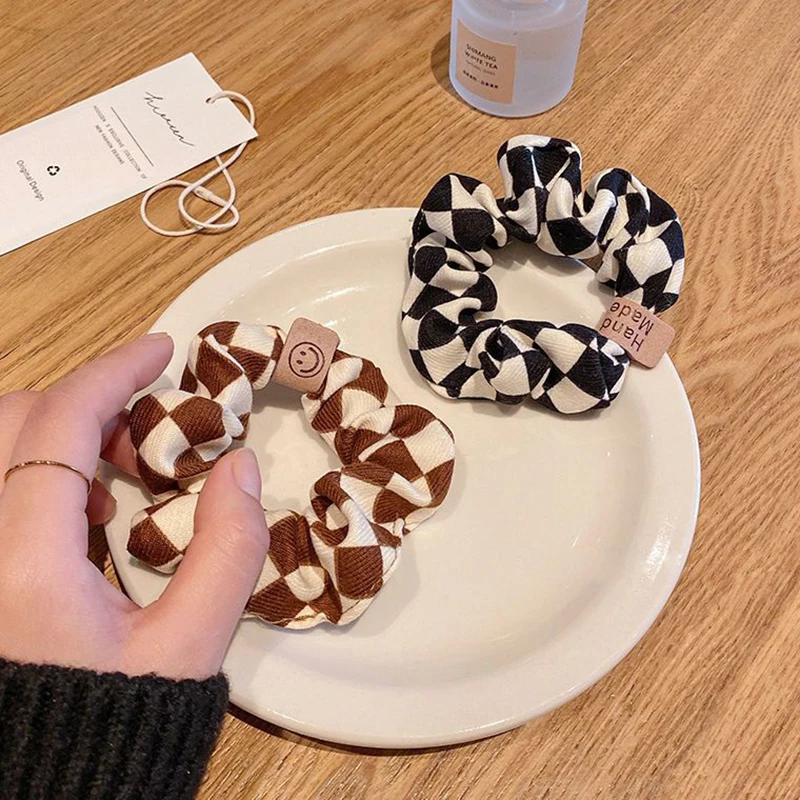 

Large Intestine Hair Ring Checkered smiley Head Rope Female Temperament Tie Hair Rope Internet Celebrities Elegant Rubber Band