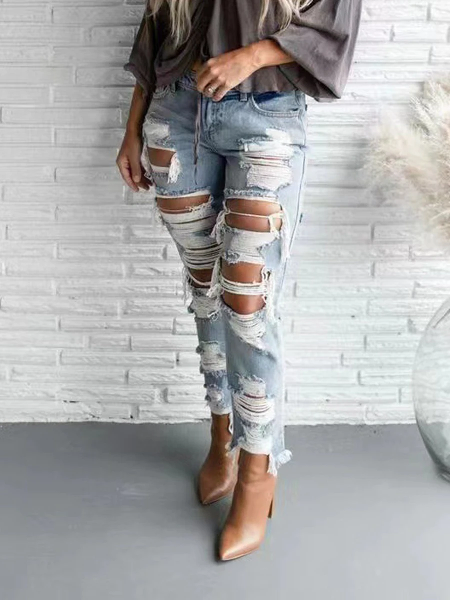 

Tattered blue jeans women ripped hollow out streetwear denim trousers 2022 summer new female denim pencil pants