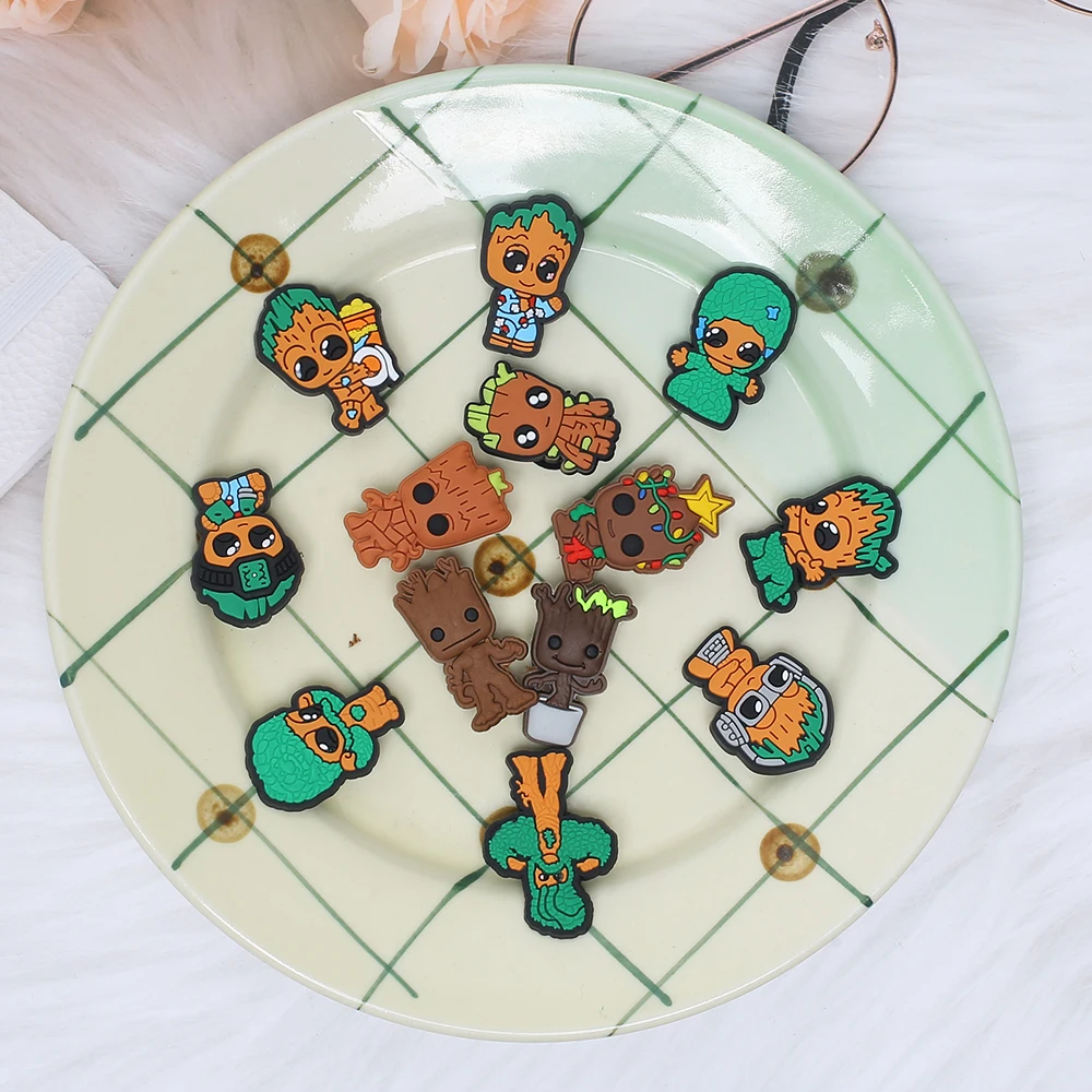 

Single Sale 1pcs Movie Little Tree Man PVC Shoe Charms Accessories Decoration Buckles Accessories Fit Bands Bracelets Croc JIBZ