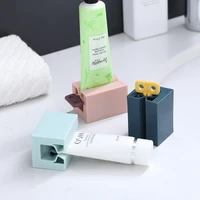 toothpaste dispenser tube squeezer tooth paste squeezer facial cleanser press rolling holder bathroom accessories for kids