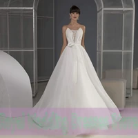 exquisite wedding dresses v neck draped sleeveless tuiie applique bows sash 2022 sweep open back high quality gowns robe de ma