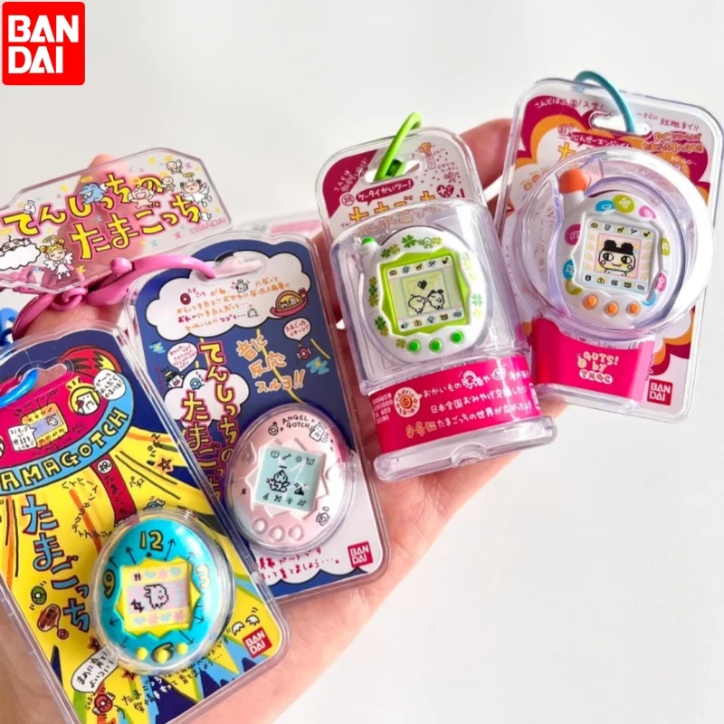 Фото Электронный питомец-брелок Bandai Tamagotchi, коллекционный шокуган, подвеска для сумки, в подарочной коробке, коллекционный сувенир, игрушка для коллекционеров №1