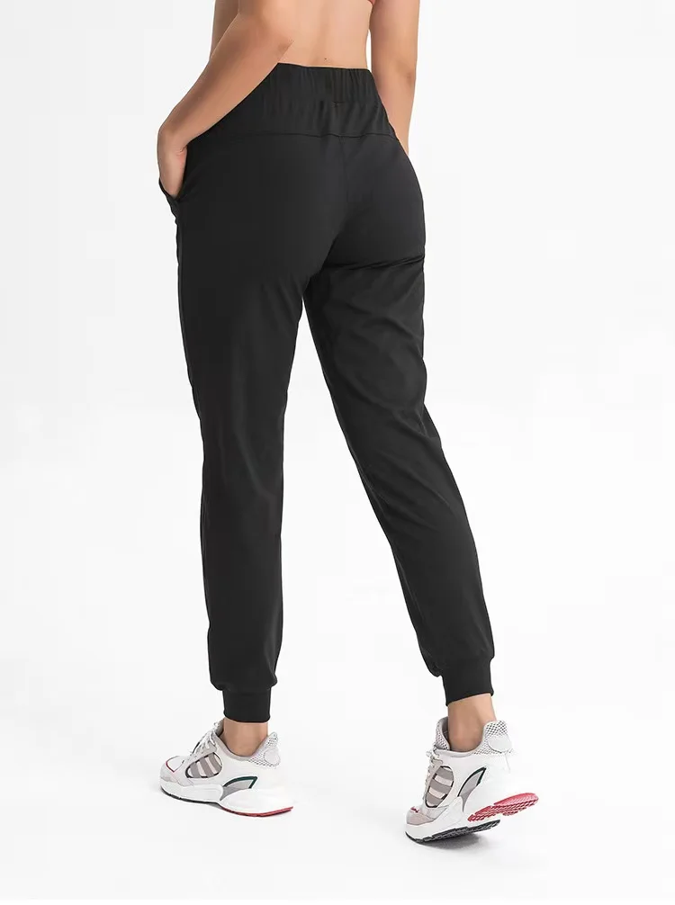 With Logo Women Fitness Jogger Leggings with two side pockets  Stretch fabrics Loose Fit Sport Active Skinny Ankle-Length Pants