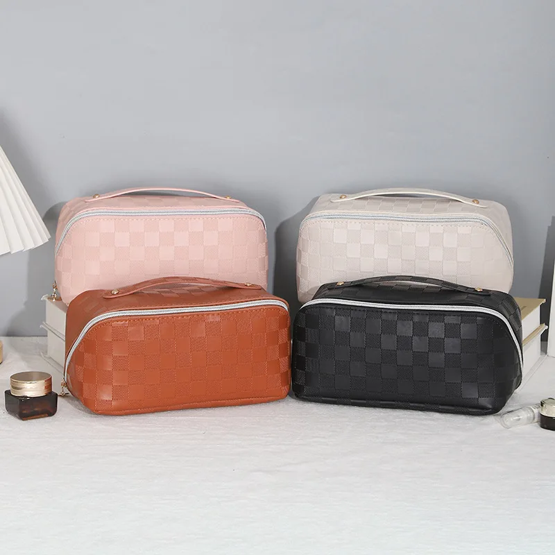 

2023 New Storage Bag Checker Travel Wash Bag Portable Advanced Sense Happy Fish Makeup Bag Simple and Large Capacity