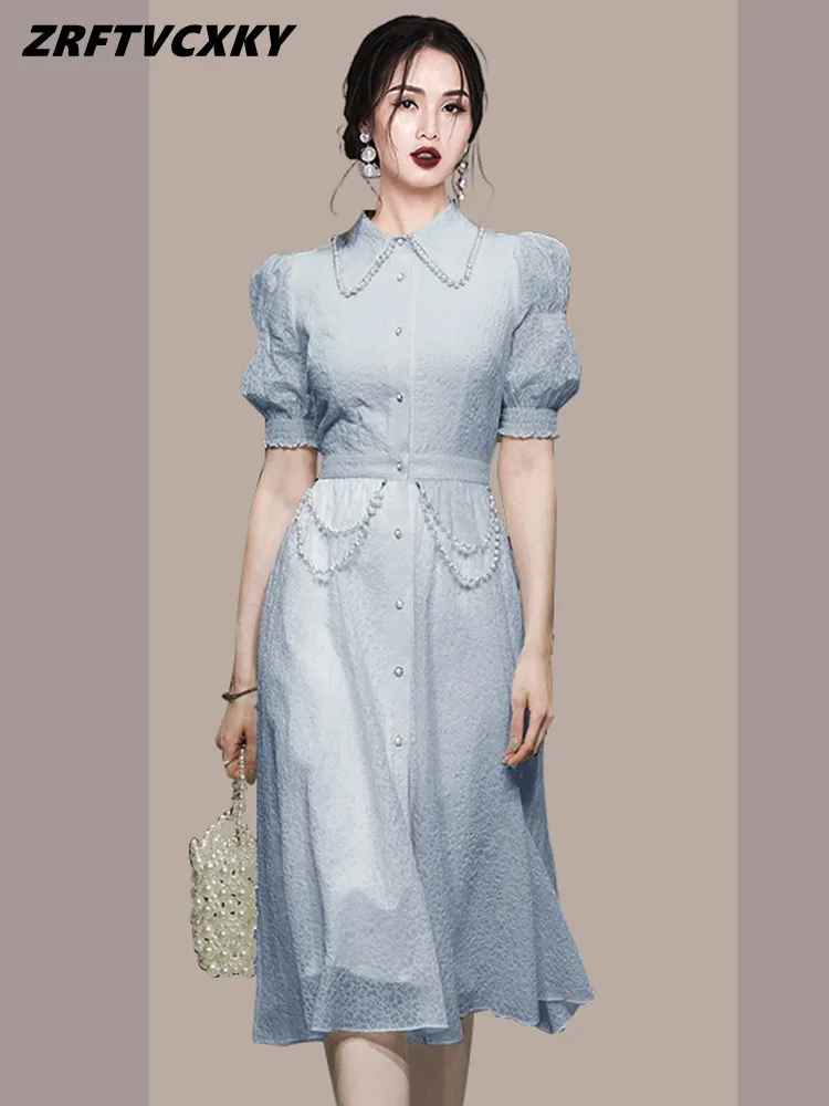 

ZRFTVCXKY New Luxury Women Blue Shirt Dresses Summer Fashion Lapel Beading Elegant Lantern Sleeve High Waist Simple A-Line Dress