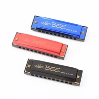 2022 new 10 hole 20 tone plastic toy carton harmonica childrens beginner wind instrument blue red and black three colors
