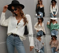 2022 autumn and winter new button womens loose solid color twisted rope knitted cardigan womens sweater women