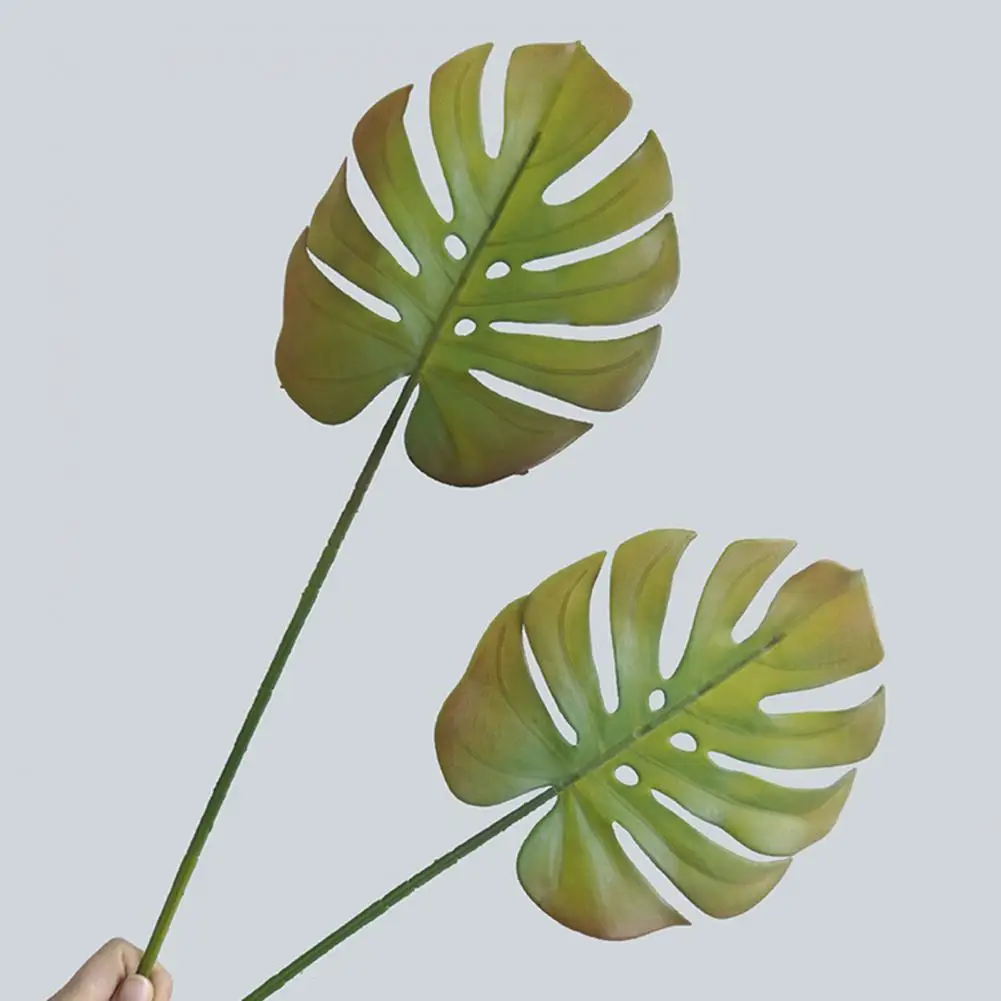 

Artificial Leaf Realistic Shape Widely Applied Flexible Decorative Plastic Fake Monstera Leaf Home Decoration Artificial Plants