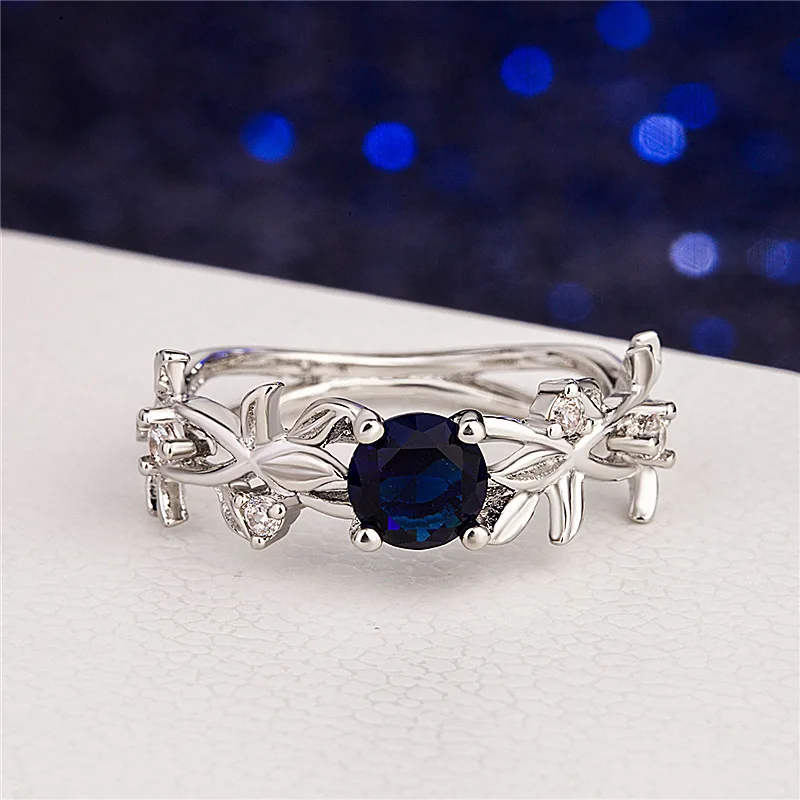 

Best Selling Jewelry European and American Popular Olive Leaf Multicolor Inlaid Zircon Female Ring Whole Sale Jewelry