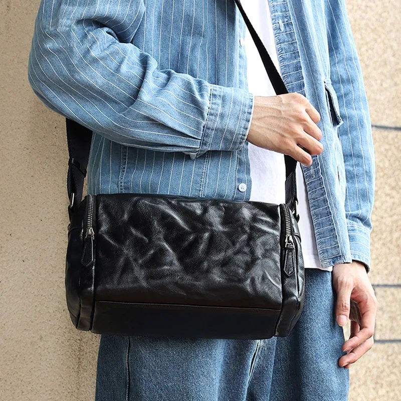 

AETOO Vegetable tanned leather functional men's messenger bag clutch pattern trend new messenger men's bag leather casual shoul