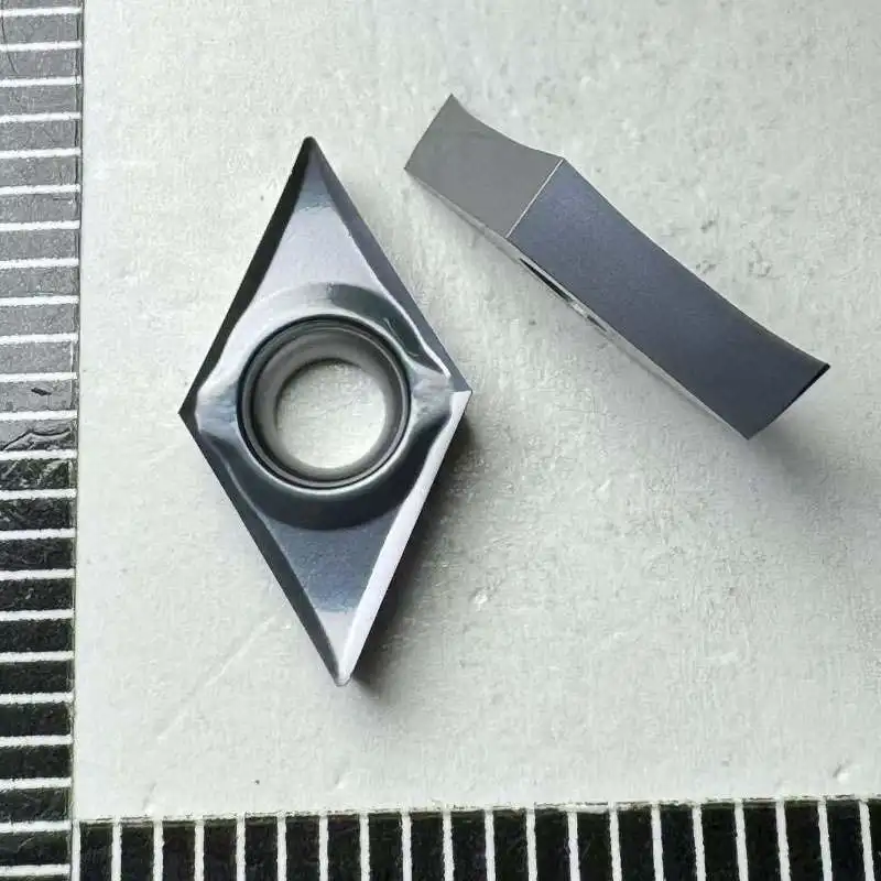 

DCGT070201 DCGT070202 DCGT070204 DCGT11T301 DCGT11T302 DCGT11T304 DL1 Твердосплавная вставка Токарные инструменты с ЧПУ Токарные станки