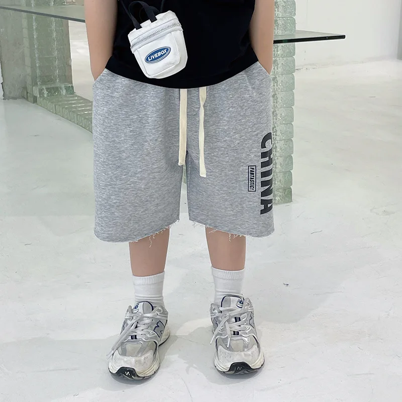 

Boys' trousers summer 2022 new trendy children's five-point pants children's casual pants sports Japan and South Korea