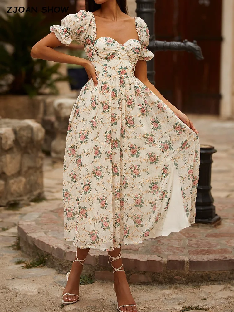 

Женское платье-миди с V-образным вырезом и пышными рукавами