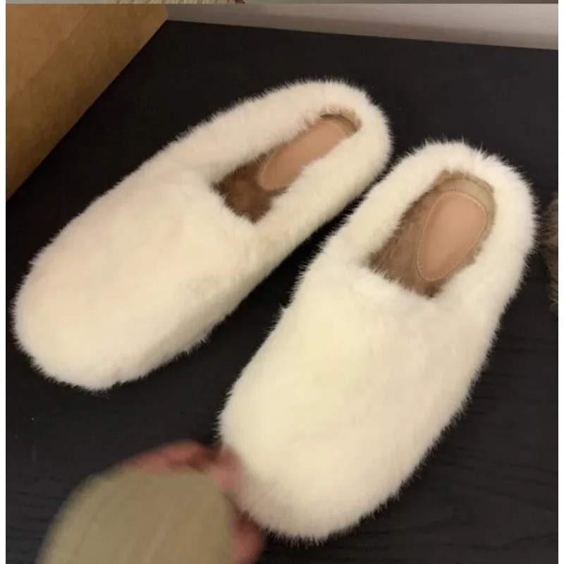 Меховые тапочки женские
