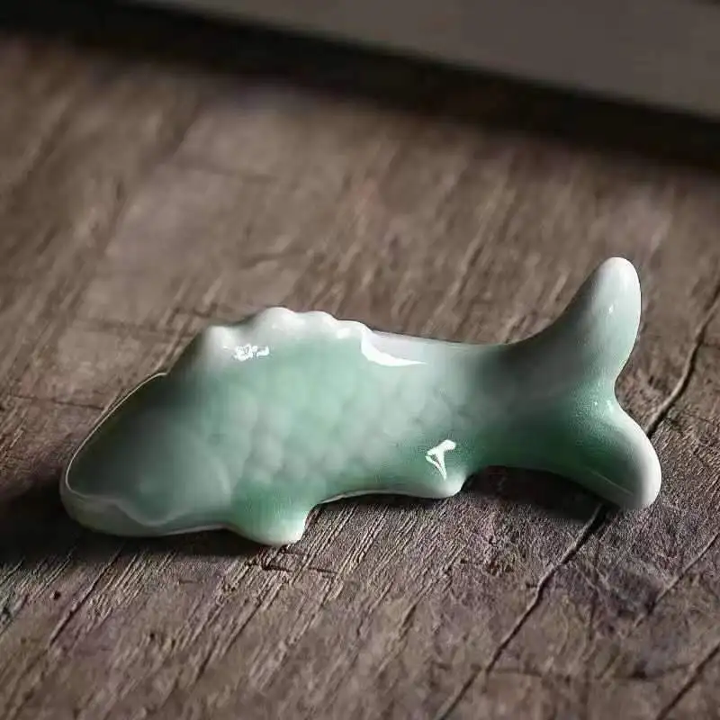 

Керамические рыбки-подставки для ручек YXYMCF