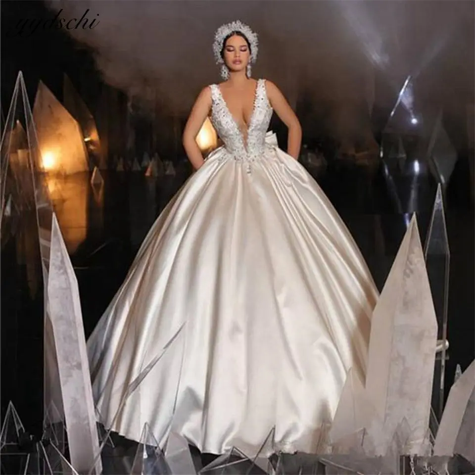 

Gorgeous Ivory Sleeveless Wedding Dresses 2023 Deep V-Neck Puffy Ball Gown Sequined Bridal Gowns Court Train Vestido De Noiva