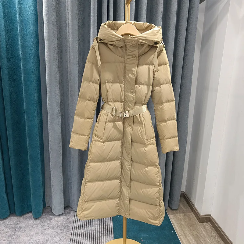 Winter 2022 New European long down jacket women's knee-length lace-up slim slim white eiderdown jacket with thick hat