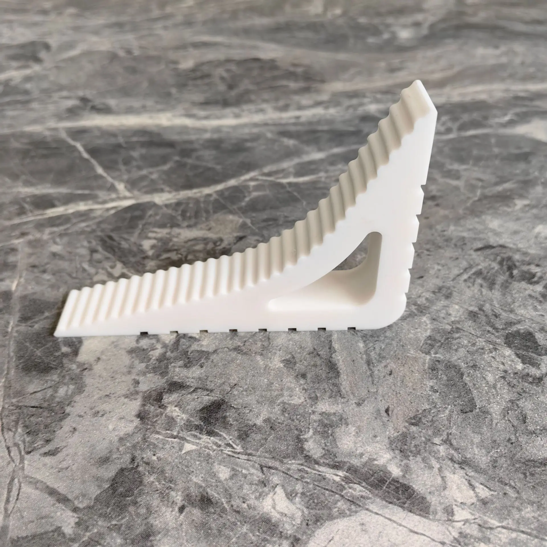 

Резиновый дверной ограничитель