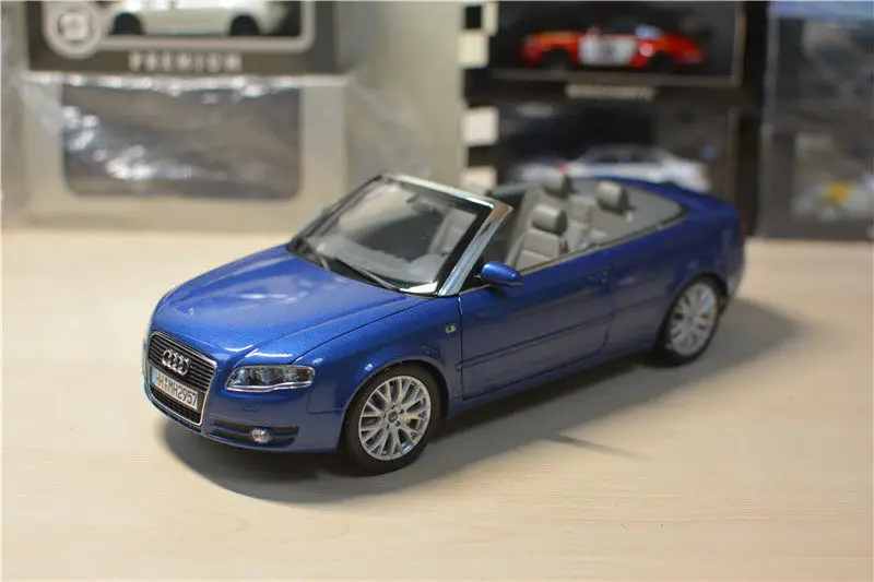 Фото Масштабная модель автомобиля Audi A4 Convertible 3.2 Norev 1:18 из литого металла №1