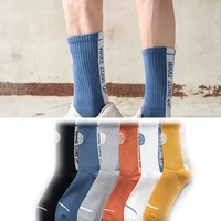 mens and womens sports basketball socks sweat absorbing breathable ins tide socks mens solid color long mid tube cotton socks