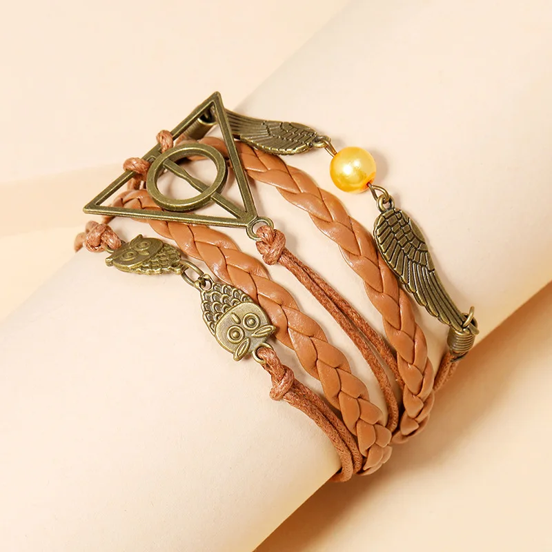 

Harry Potter Death Hallows Golden Wings Snitchs Quidditch Ball Owl Hedwig Layer Handmade Woven Leather Bracelet Action Toys