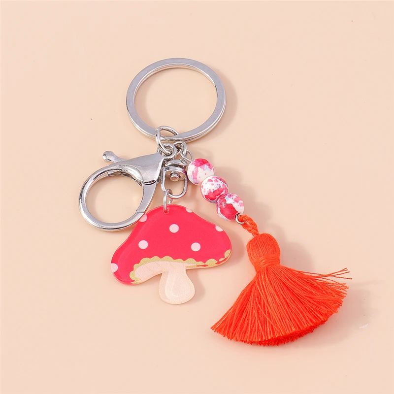 

Bohemian Tassel Keychains Cute Resin Mushroom Charms Pendants Keyrings Souvenir Gifts for Women Men Car Key Handbag Key Chains