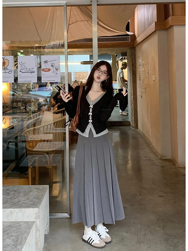 Искусственная двухсекционная короткая трикотажная рубашка с бантом женская