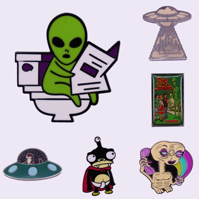 

UFO Enamel Pins Custom Strange Alien Read The Newspaper Brooch Lapel Badges Backpack Cartoon Jewelry Gift For Friends Wholesale