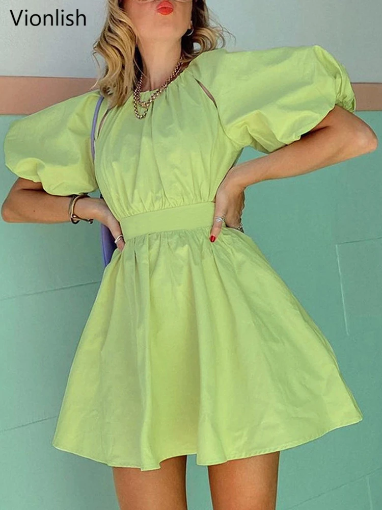 

Женское платье-трапеция с круглым вырезом, открытой спиной и пышными рукавами