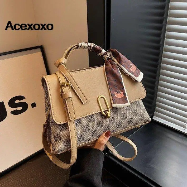 

2023 summer new Europe and the United States retro Western-style niche handbag splicing color single shoulder oblique span bag