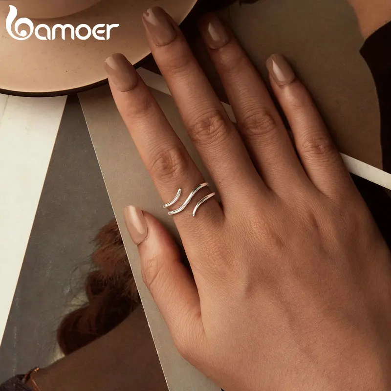 Кольцо женское регулируемое многослойное из серебра