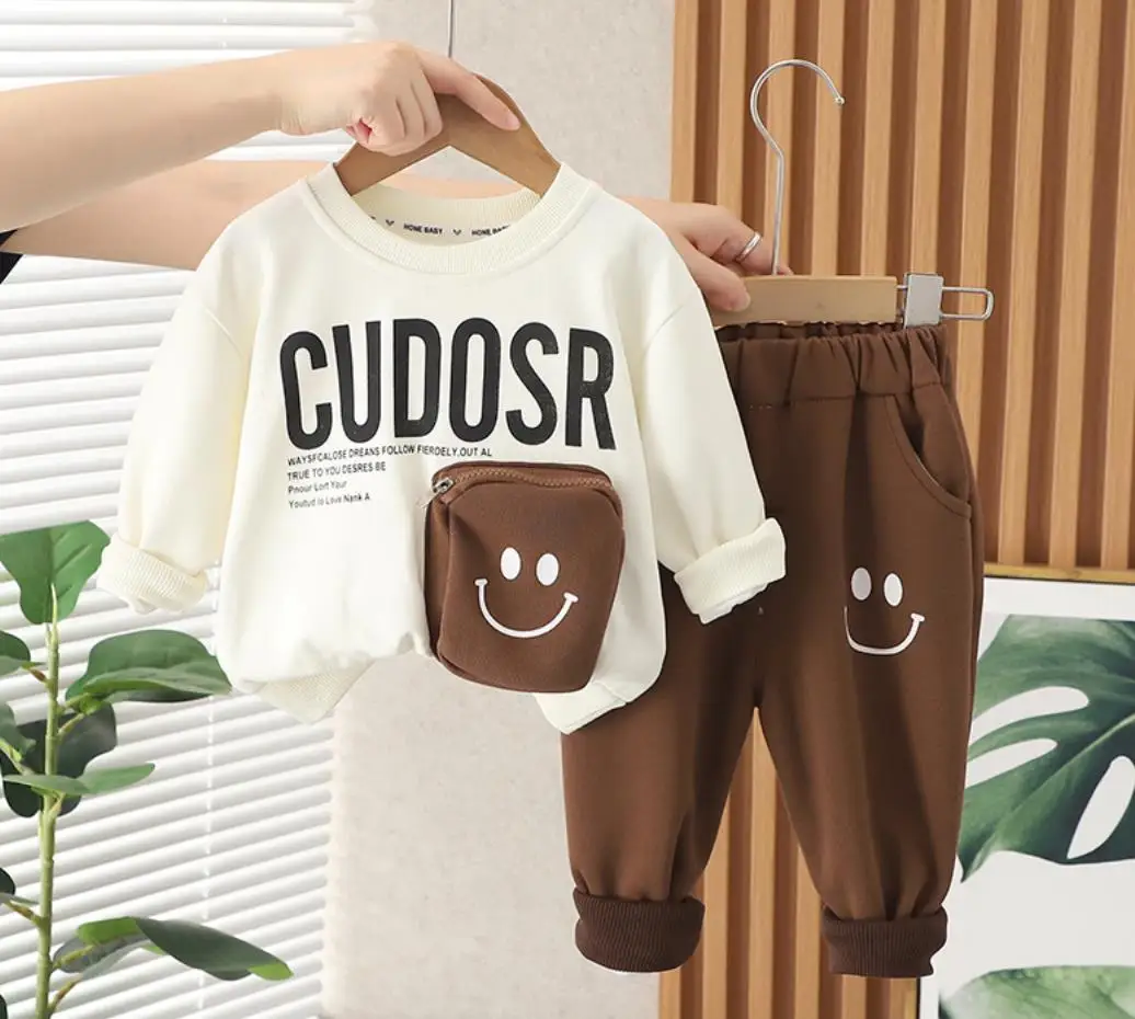 

Детская дизайнерская одежда для малышей на весну и осень, толстовка с длинным рукавом и штаны с мультяшным рисунком смайликом и карманами, детские костюмы, комплект одежды для мальчиков