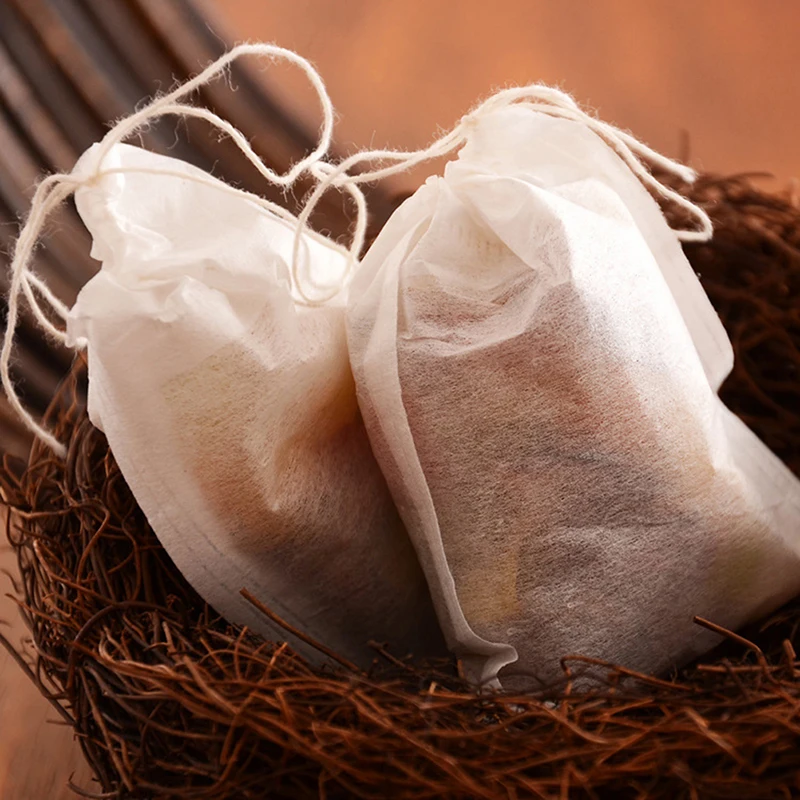 

100Pcs Teabags Biodegradable Paper Tea Bag Drawstring Eco-Friendly Filter Empty Tea Bags Loose Leaf Tea Powder Herbal Medicine