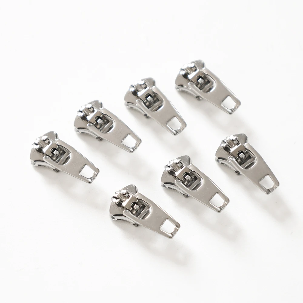 

Raw Nickel 4.5# Stainless Steel Metal Zipper YG Slider Puller slider 3# Stainless Steel Metal YG slider for Finished Zipper