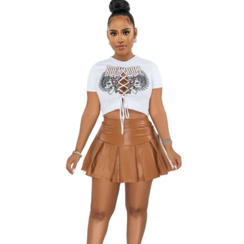 

Women's Two Piece Set 2023 New Fashion Hollow Binding Crop Short Sleeved Blouse PU Leather Pleated Skirt Leisure Commuting Suit
