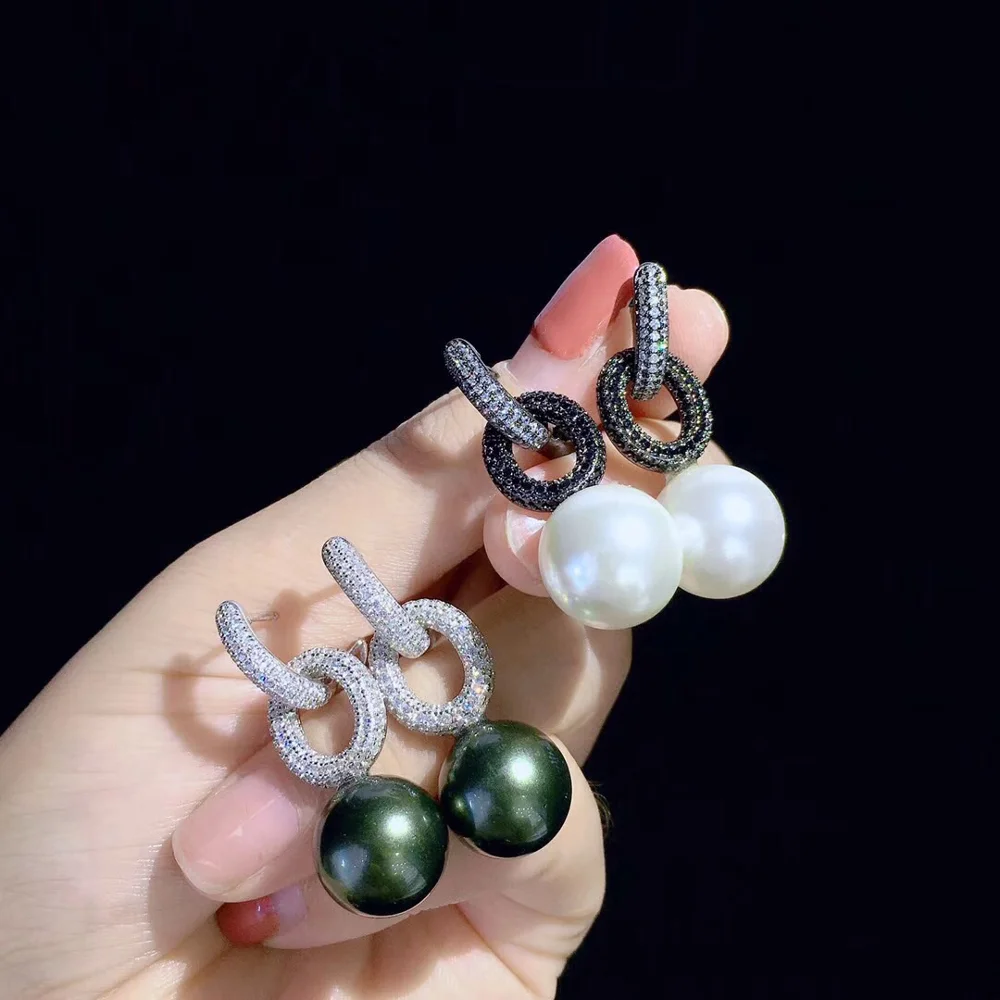 

Round White Sea Shell Pearl Cz pave Stud Earrings