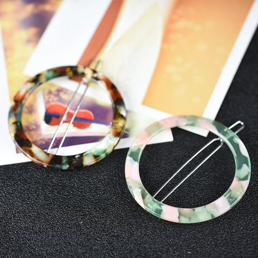 

Женская круглая заколка-пряжка для волос