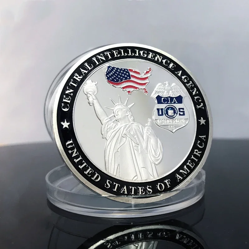 

Посеребренная коллекционная монета ЦРУ 40 мм