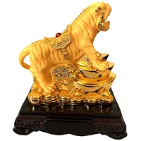 tiger statue chinese tiger figurine with tiger lying on lucky money coins as a symbol of good luck and wealth table top feng