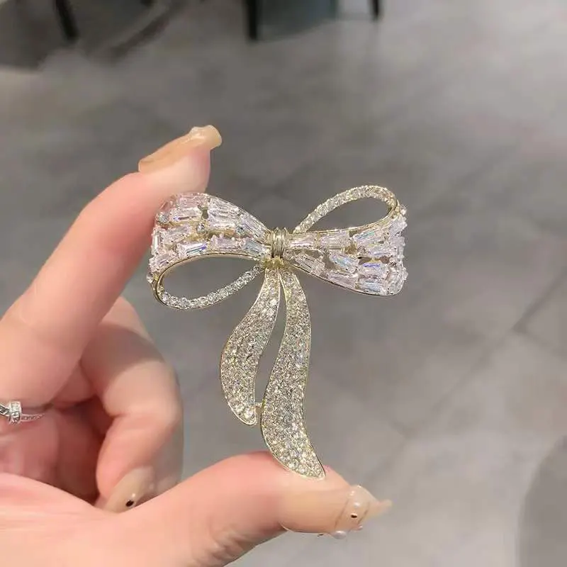 

Bow tie zircon rhinestone brooch female simple personality fashion pin suit anti-light corsage